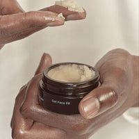 Holding The Deep Balm jar
